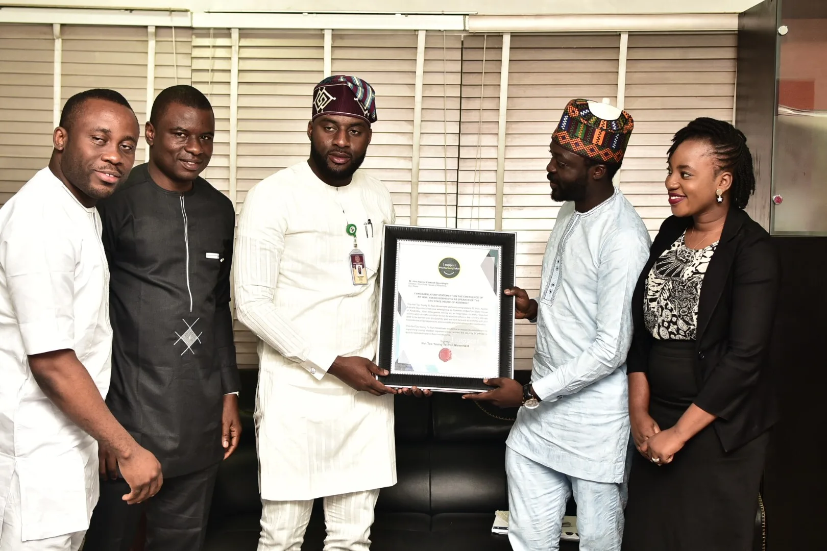 YoungCare Initiative presenting a certificate during an advocacy visit
